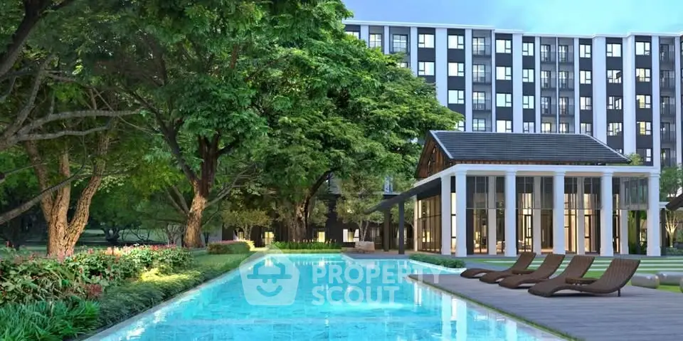 Luxurious apartment complex with serene pool and lush greenery