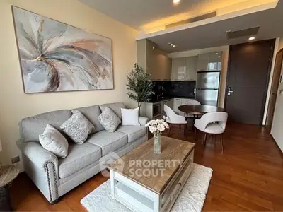 Stylish living room with modern kitchen in open layout apartment