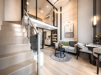 Modern loft apartment with stylish living room and staircase