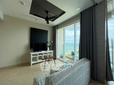Modern living room with ocean view and stylish decor