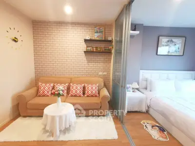 Cozy studio apartment with stylish decor and comfortable living space.