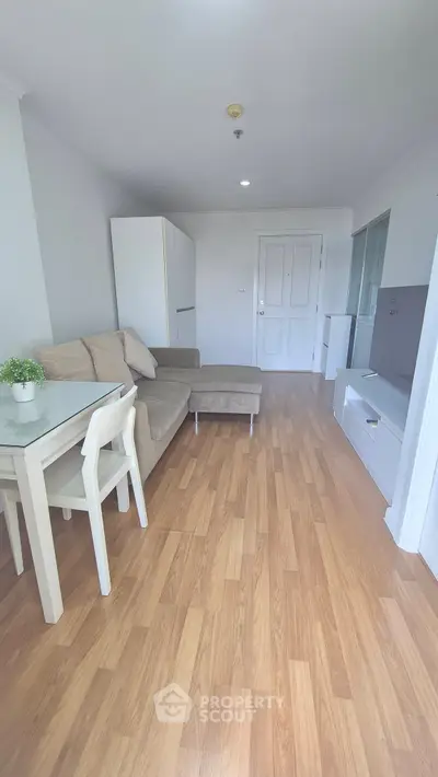 Cozy living room with modern furniture and wooden flooring