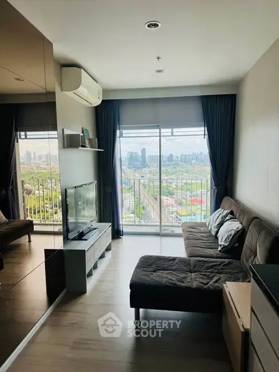 Modern living room with city view, sleek furniture, and large windows.