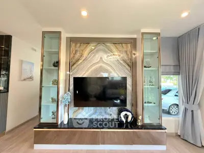 Luxurious living room with elegant TV wall and stylish decor