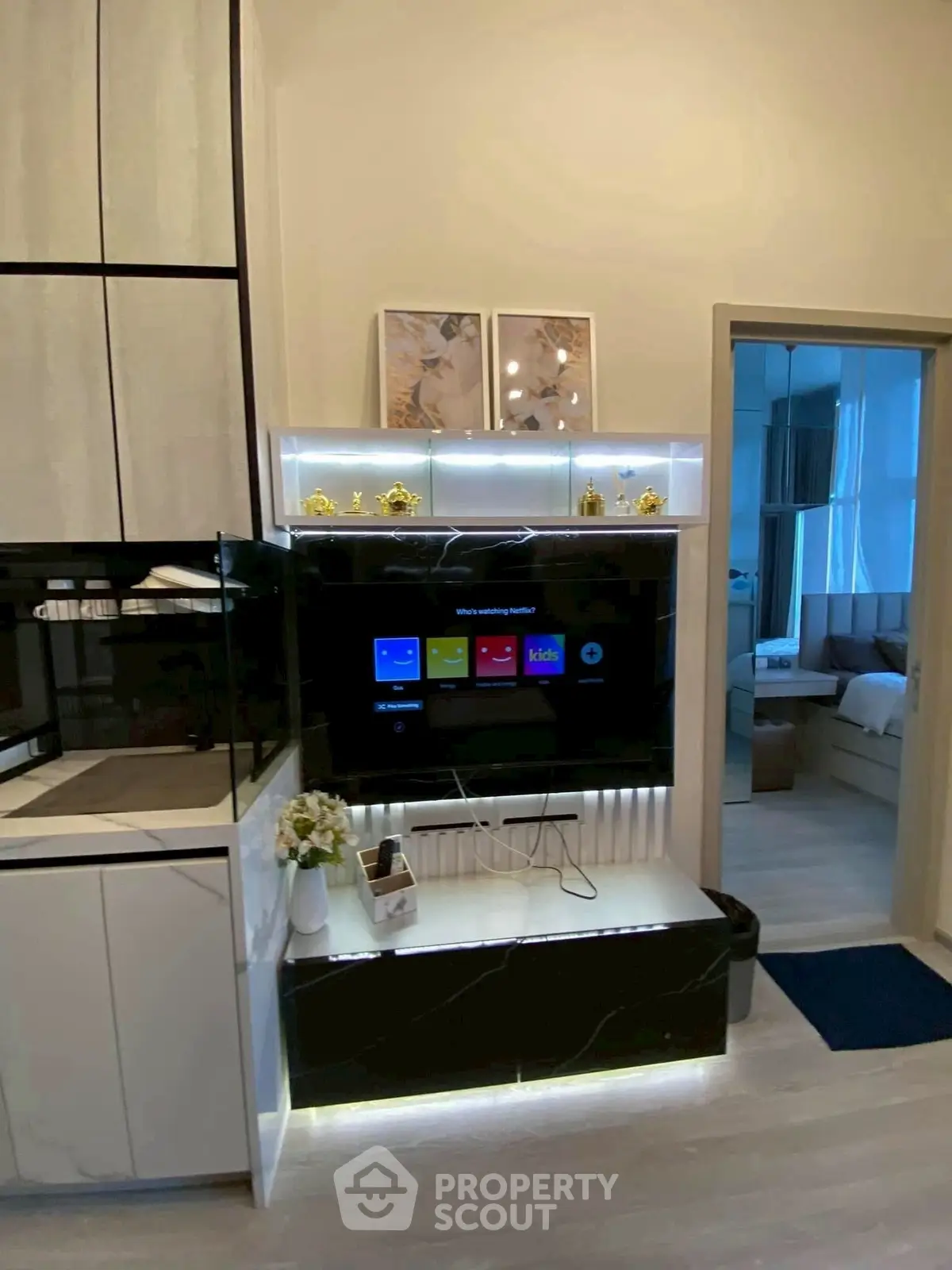 Modern living room with sleek TV setup and stylish decor