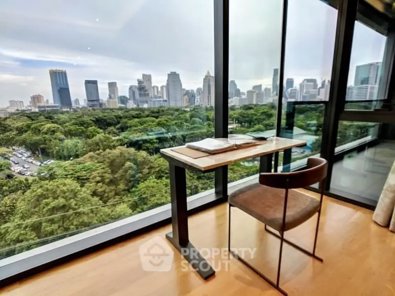 Luxurious high-rise apartment with stunning city skyline and park views, featuring a modern study area.