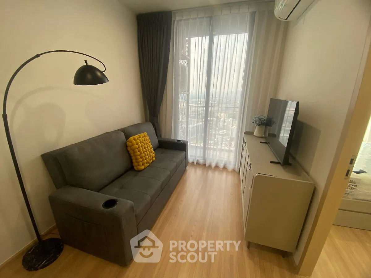 Cozy living room with modern decor and city view