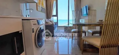 Luxurious beachfront apartment with modern interior and stunning ocean view