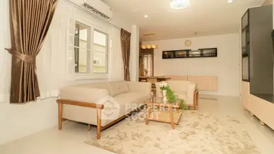 Spacious living room with modern furniture and elegant decor