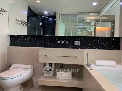 Modern bathroom with sleek design and luxurious fixtures.