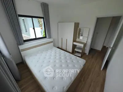 Modern bedroom with minimalist design and natural light