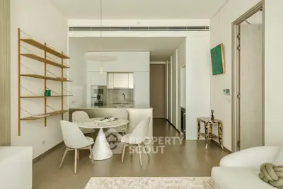 Modern open-plan living room with dining area and stylish decor