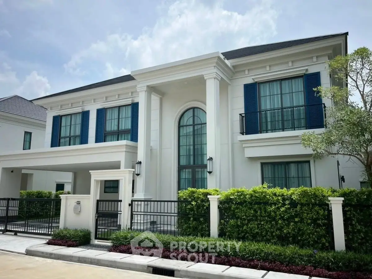 Luxurious modern villa with elegant facade and lush landscaping