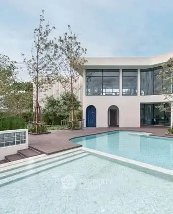Modern luxury home with stunning pool and elegant architecture