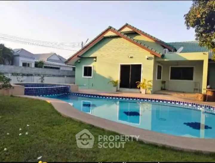 Charming suburban home with inviting pool and lush garden, perfect for relaxation and entertaining.