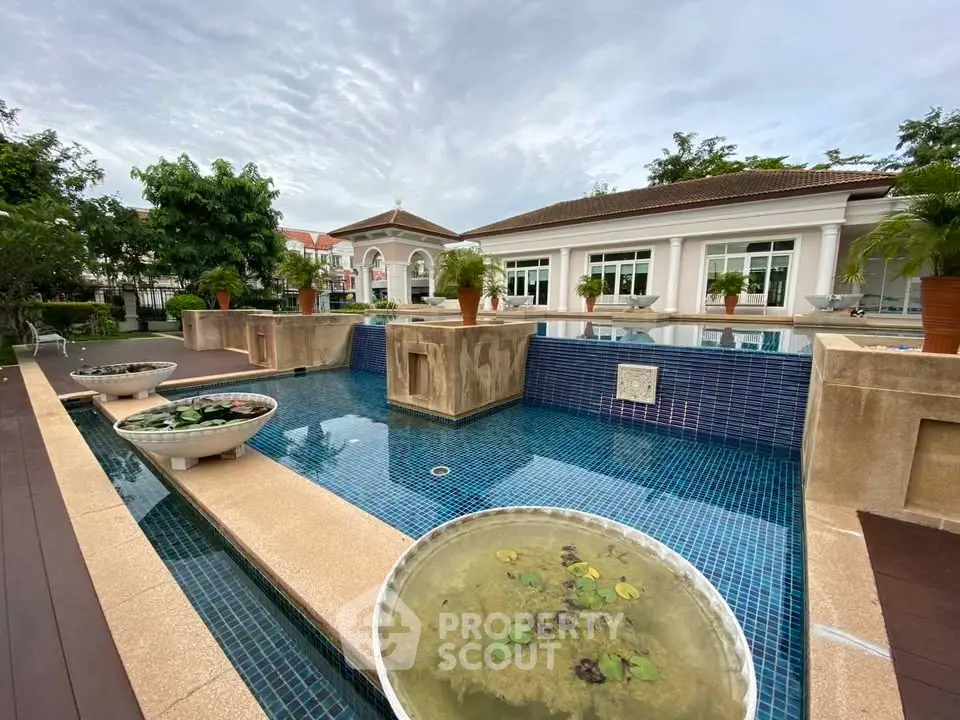 Luxurious pool area with elegant landscaping and modern design