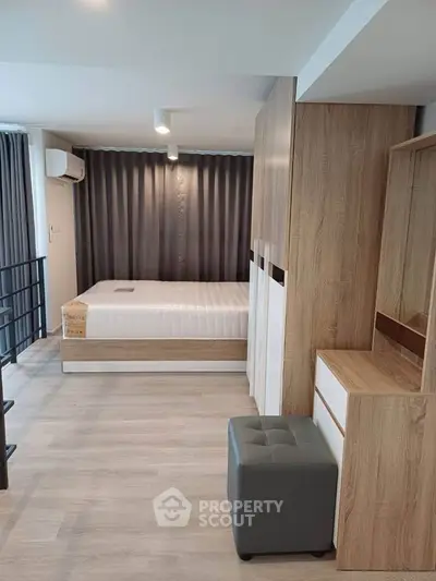 Modern bedroom with stylish wooden furniture and cozy ambiance