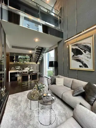 Luxurious modern living room with high ceilings and elegant decor in a stylish apartment.