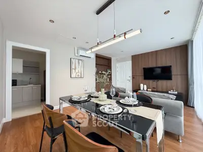 Modern living room with elegant dining area and stylish decor