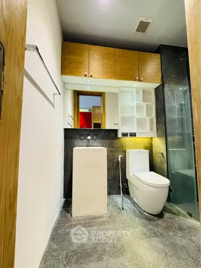 Modern bathroom with sleek design and ample storage space