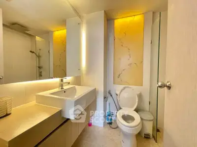 Modern bathroom with stylish lighting and sleek fixtures