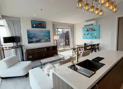 Luxurious modern living room with open kitchen and stunning decor