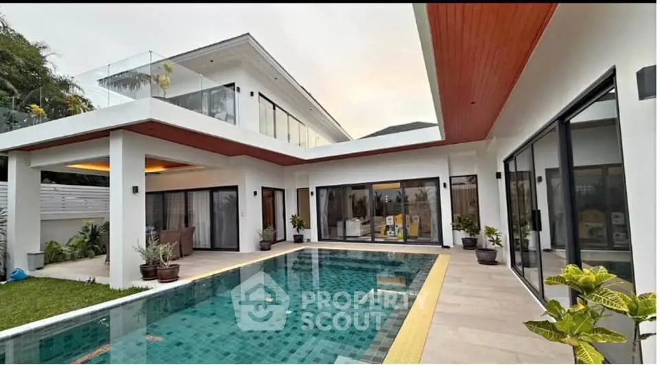 Luxurious modern villa with private pool and spacious balcony, perfect for upscale living.