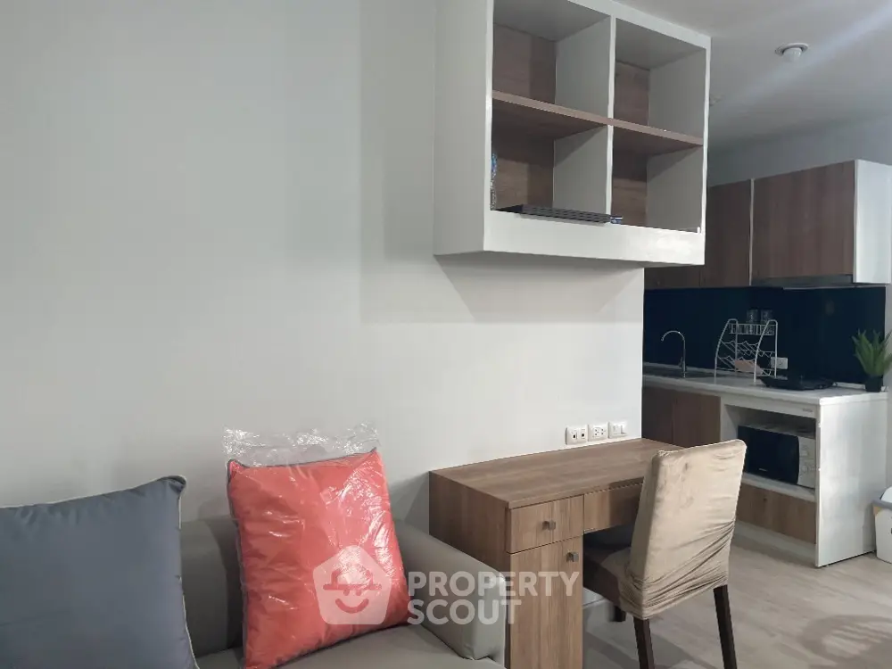 Modern apartment interior with cozy living area and stylish kitchen