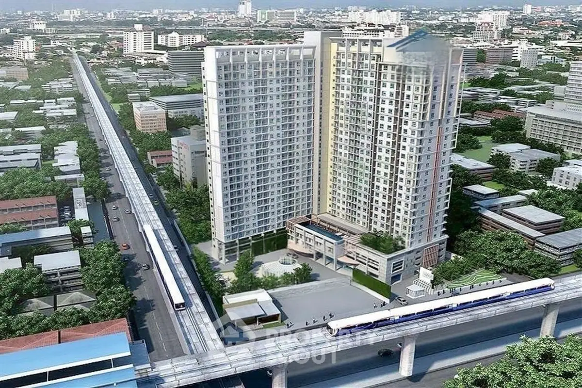 Modern high-rise condominium with cityscape and nearby transit access