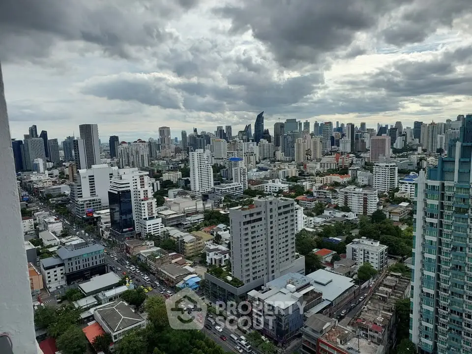 Stunning cityscape view showcasing a vibrant urban skyline with modern high-rise buildings and lush greenery.