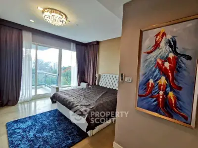 Luxurious bedroom with elegant decor and balcony view