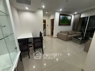 Spacious modern living room with elegant decor and open layout, perfect for relaxation and entertainment.