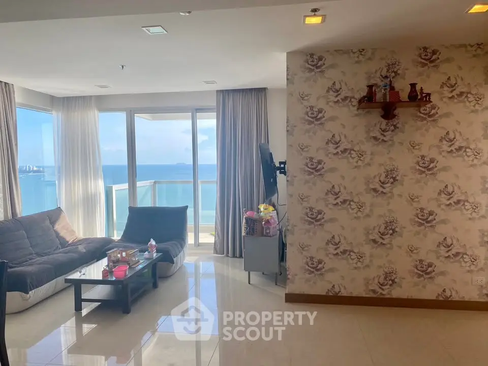 Luxurious living room with stunning ocean view and elegant decor