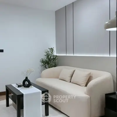 Modern living room with elegant beige sofa and stylish decor