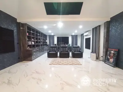 Expansive modern living room with polished marble floors, plush seating, and a sophisticated entertainment unit, ideal for upscale urban living.