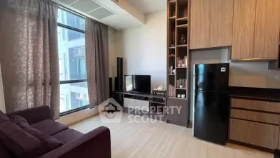 Modern living room with large window and stylish furniture in urban apartment