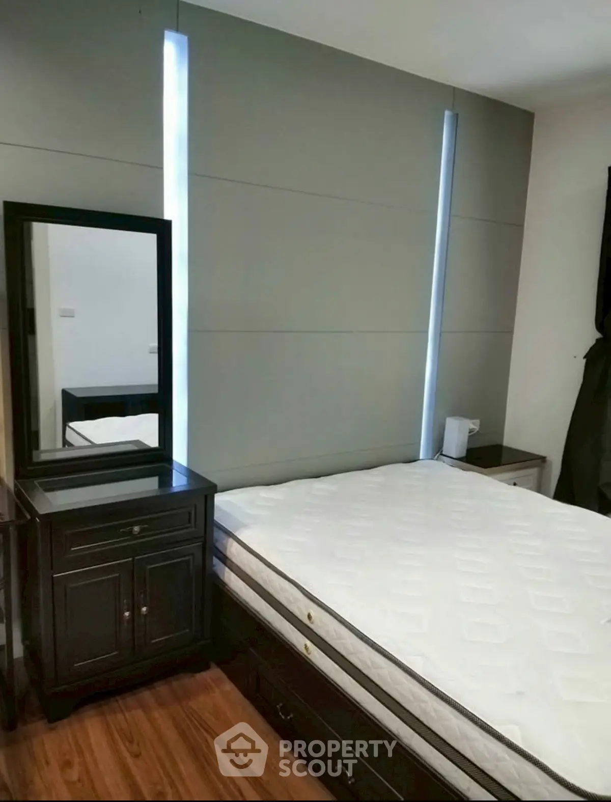 Modern bedroom with sleek design and stylish furniture