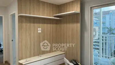 Modern interior with wood paneling and balcony view, perfect for stylish living.