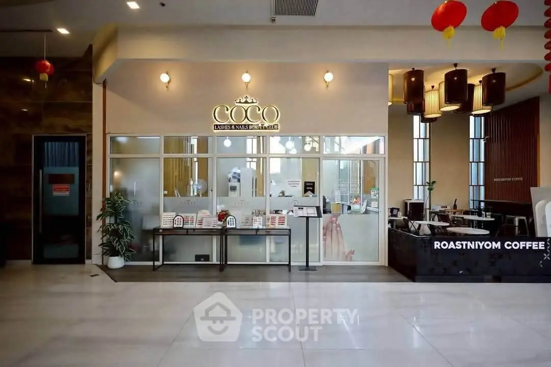 Modern commercial space with sleek design and inviting coffee shop ambiance.