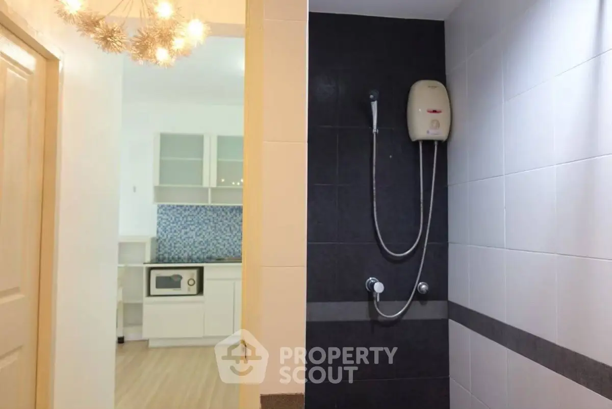 Modern kitchen and bathroom with stylish fixtures and appliances