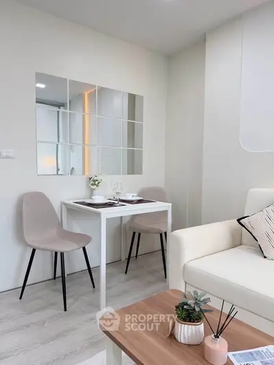 Modern living room with elegant dining area and stylish decor