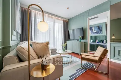 Luxurious living room with modern decor and stylish furniture in elegant apartment.