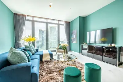Luxurious modern living room with panoramic city views and elegant decor
