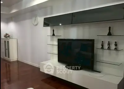 Modern living room with sleek TV unit and elegant decor