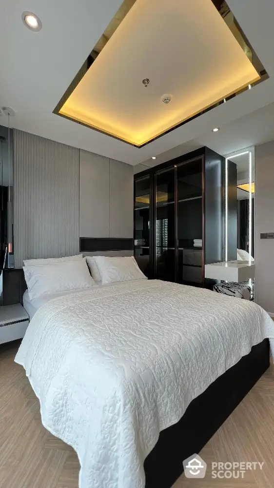 Luxurious modern bedroom with elegant lighting and stylish decor