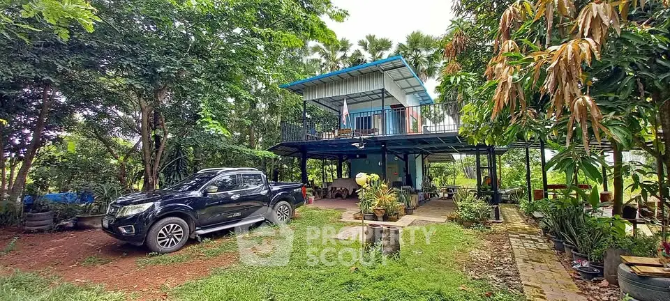 Charming two-story home with lush garden and spacious outdoor area