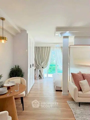Bright and airy open-plan living room with elegant decor and natural light