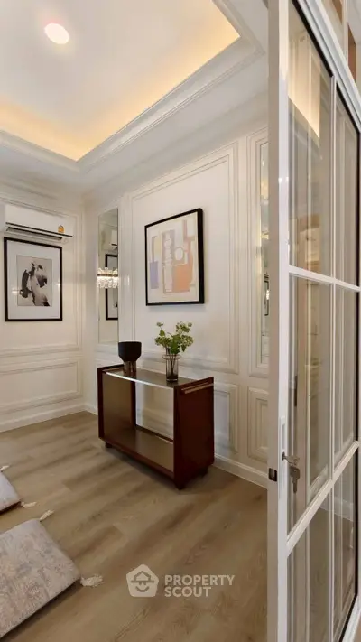 Elegant living room with modern decor and stylish wooden flooring