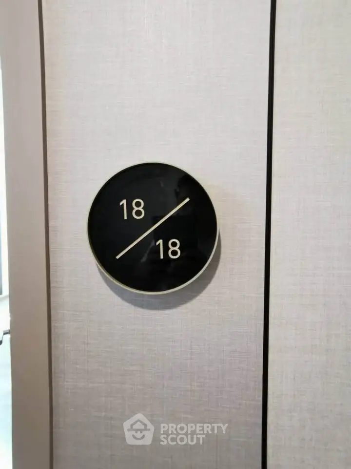 Modern elevator floor indicator with sleek design in upscale building.