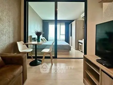 Modern studio apartment with open layout and stylish furnishings